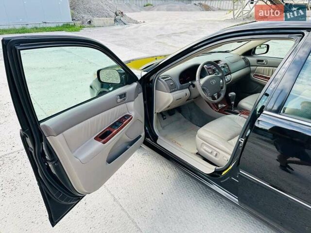 Черный Тойота Камри, объемом двигателя 3 л и пробегом 195 тыс. км за 6900 $, фото 7 на Automoto.ua