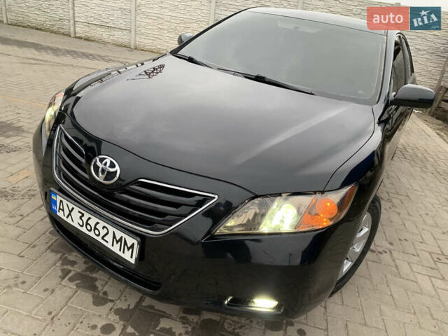 Черный Тойота Камри, объемом двигателя 3.5 л и пробегом 325 тыс. км за 7999 $, фото 35 на Automoto.ua