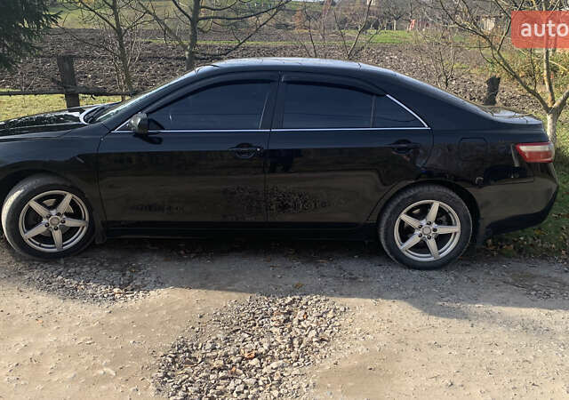 Чорний Тойота Камрі, об'ємом двигуна 2.4 л та пробігом 274 тис. км за 7500 $, фото 1 на Automoto.ua