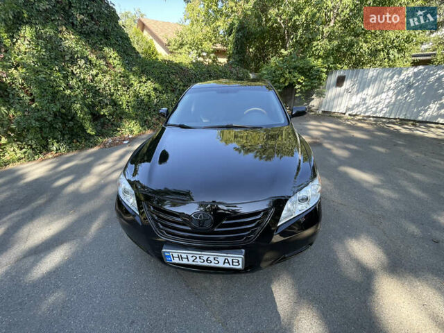 Черный Тойота Камри, объемом двигателя 3.46 л и пробегом 315 тыс. км за 7699 $, фото 1 на Automoto.ua
