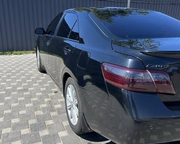 Черный Тойота Камри, объемом двигателя 3.5 л и пробегом 272 тыс. км за 8500 $, фото 3 на Automoto.ua