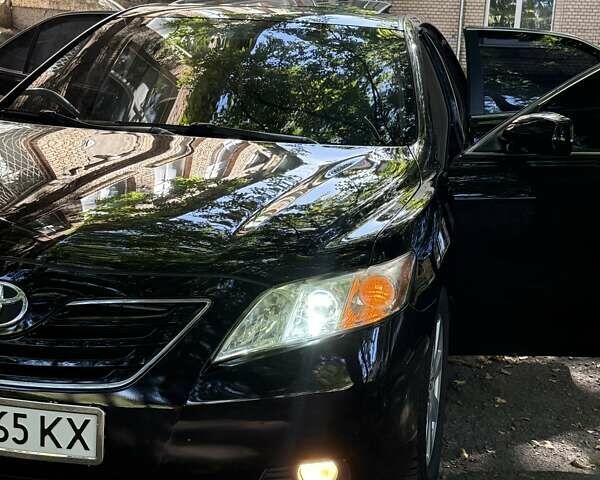 Тойота Камри 2006 в Хмельницком на Automoto.ua Черный Тойота Камри, объемом двигателя 2.36 л и пробегом 340 тыс. км за 8499 $, фото 22 на Automoto.ua