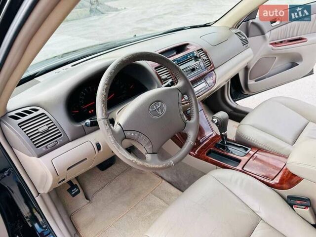 Черный Тойота Камри, объемом двигателя 3 л и пробегом 195 тыс. км за 6900 $, фото 21 на Automoto.ua