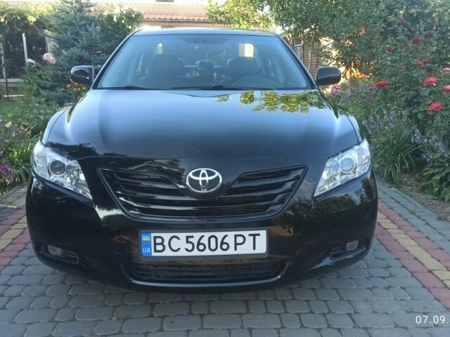 Черный Тойота Камри, объемом двигателя 2.4 л и пробегом 236 тыс. км за 7800 $, фото 22 на Automoto.ua