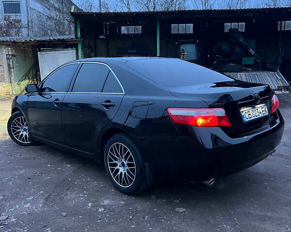 Черный Тойота Камри, объемом двигателя 3.46 л и пробегом 264 тыс. км за 9800 $, фото 2 на Automoto.ua