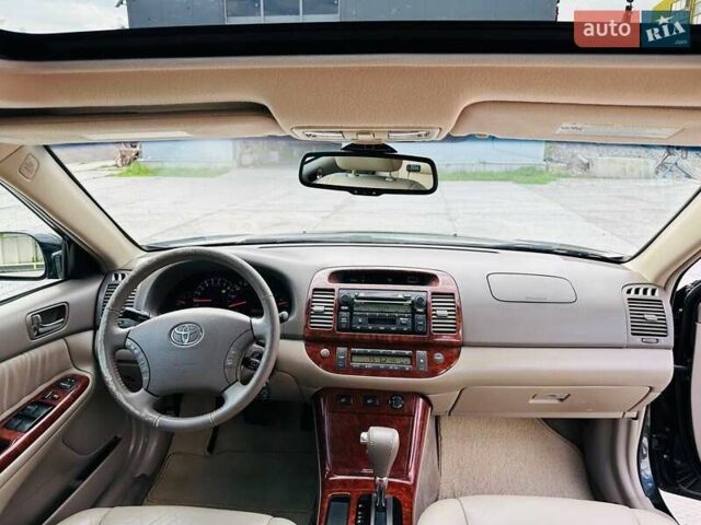 Черный Тойота Камри, объемом двигателя 3 л и пробегом 195 тыс. км за 6900 $, фото 13 на Automoto.ua