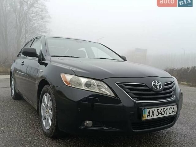 Черный Тойота Камри, объемом двигателя 3.46 л и пробегом 169 тыс. км за 10300 $, фото 1 на Automoto.ua