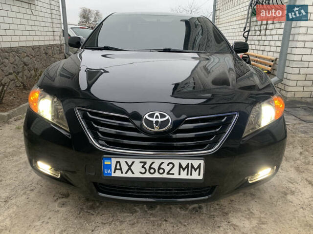 Черный Тойота Камри, объемом двигателя 3.5 л и пробегом 325 тыс. км за 8400 $, фото 30 на Automoto.ua