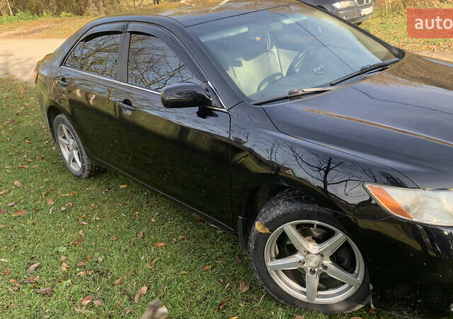 Чорний Тойота Камрі, об'ємом двигуна 2.4 л та пробігом 274 тис. км за 7500 $, фото 3 на Automoto.ua