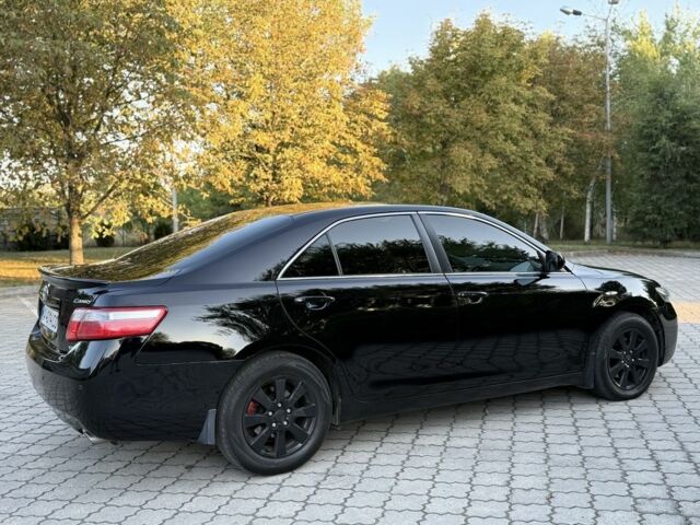 Черный Тойота Камри, объемом двигателя 3.5 л и пробегом 245 тыс. км за 7500 $, фото 7 на Automoto.ua