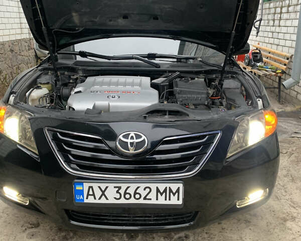 Черный Тойота Камри, объемом двигателя 3.5 л и пробегом 325 тыс. км за 8400 $, фото 19 на Automoto.ua