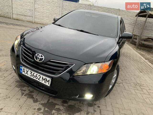 Черный Тойота Камри, объемом двигателя 3.5 л и пробегом 325 тыс. км за 8400 $, фото 43 на Automoto.ua