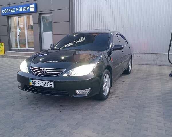 Чорний Тойота Камрі, об'ємом двигуна 2.36 л та пробігом 270 тис. км за 6100 $, фото 5 на Automoto.ua