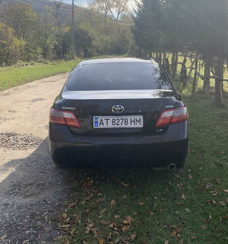 Чорний Тойота Камрі, об'ємом двигуна 2.4 л та пробігом 274 тис. км за 7500 $, фото 2 на Automoto.ua
