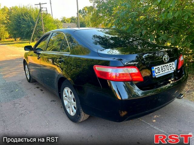 Чорний Тойота Камрі, об'ємом двигуна 2.4 л та пробігом 380 тис. км за 7499 $, фото 5 на Automoto.ua