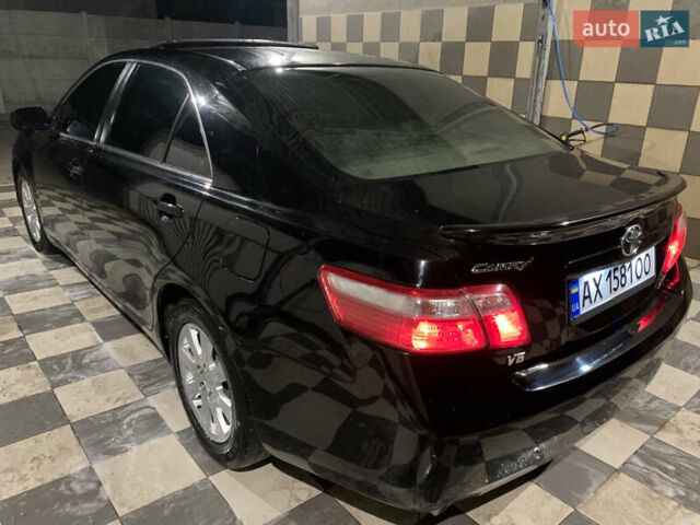 Черный Тойота Камри, объемом двигателя 3.5 л и пробегом 325 тыс. км за 7999 $, фото 70 на Automoto.ua