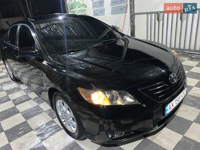 Черный Тойота Камри, объемом двигателя 3.5 л и пробегом 325 тыс. км за 7999 $, фото 71 на Automoto.ua