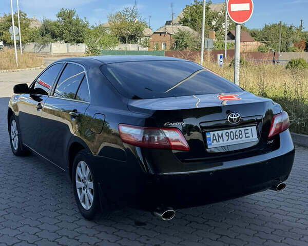 Черный Тойота Камри, объемом двигателя 3.46 л и пробегом 325 тыс. км за 7150 $, фото 4 на Automoto.ua