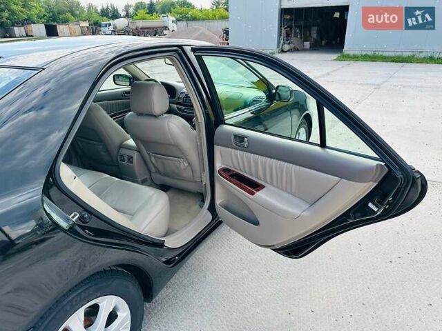 Черный Тойота Камри, объемом двигателя 3 л и пробегом 195 тыс. км за 6900 $, фото 10 на Automoto.ua