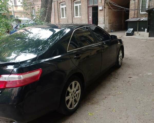 Черный Тойота Камри, объемом двигателя 3.5 л и пробегом 200 тыс. км за 6000 $, фото 2 на Automoto.ua
