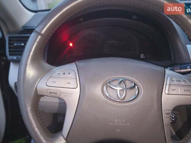 Черный Тойота Камри, объемом двигателя 2.36 л и пробегом 230 тыс. км за 10000 $, фото 12 на Automoto.ua