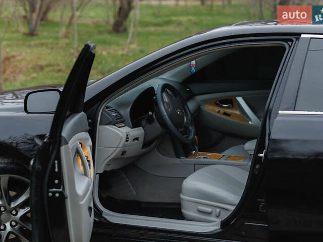 Черный Тойота Камри, объемом двигателя 3.46 л и пробегом 316 тыс. км за 9500 $, фото 55 на Automoto.ua