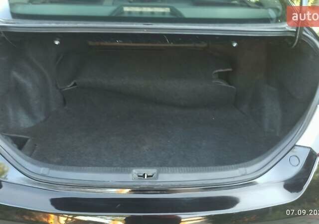 Чорний Тойота Камрі, об'ємом двигуна 2.36 л та пробігом 249 тис. км за 8150 $, фото 11 на Automoto.ua