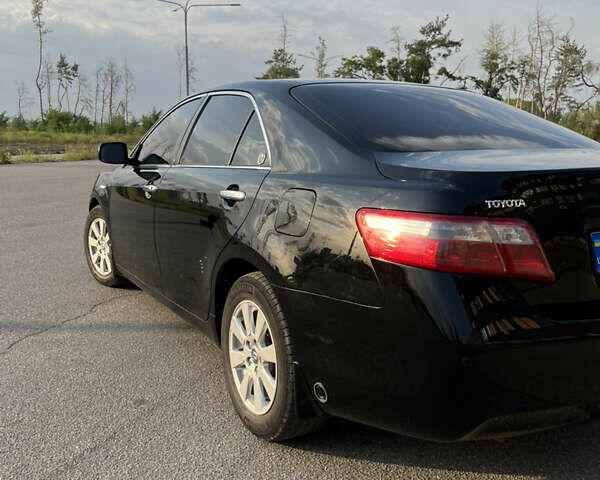 Черный Тойота Камри, объемом двигателя 2.4 л и пробегом 249 тыс. км за 9700 $, фото 11 на Automoto.ua