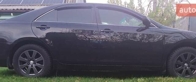 Черный Тойота Камри, объемом двигателя 2.36 л и пробегом 230 тыс. км за 10000 $, фото 4 на Automoto.ua