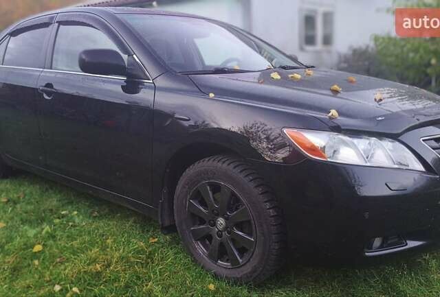 Черный Тойота Камри, объемом двигателя 2.36 л и пробегом 230 тыс. км за 10000 $, фото 9 на Automoto.ua