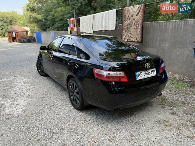 Черный Тойота Камри, объемом двигателя 2.36 л и пробегом 300 тыс. км за 7600 $, фото 5 на Automoto.ua