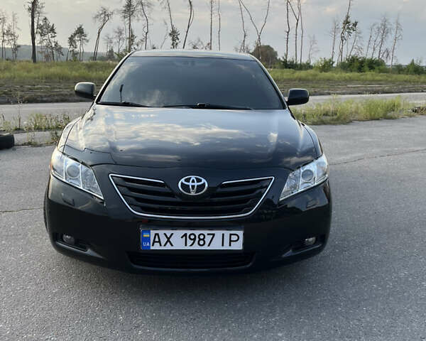 Черный Тойота Камри, объемом двигателя 2.4 л и пробегом 249 тыс. км за 9700 $, фото 4 на Automoto.ua