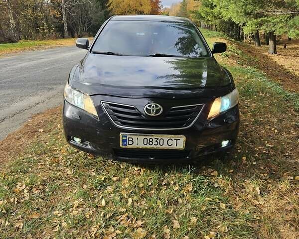 Чорний Тойота Камрі, об'ємом двигуна 2.36 л та пробігом 251 тис. км за 8900 $, фото 12 на Automoto.ua