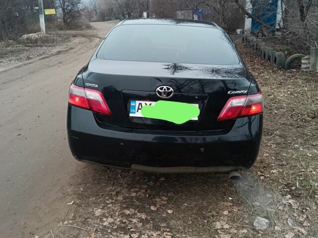 Чорний Тойота Камрі, об'ємом двигуна 2.4 л та пробігом 260 тис. км за 8000 $, фото 1 на Automoto.ua