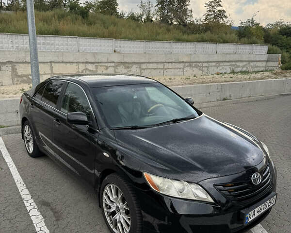 Чорний Тойота Камрі, об'ємом двигуна 3.46 л та пробігом 245 тис. км за 8699 $, фото 1 на Automoto.ua