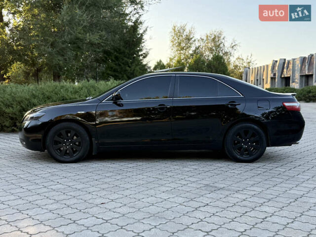 Черный Тойота Камри, объемом двигателя 3.5 л и пробегом 300 тыс. км за 7500 $, фото 2 на Automoto.ua
