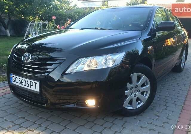 Чорний Тойота Камрі, об'ємом двигуна 2.36 л та пробігом 249 тис. км за 8150 $, фото 16 на Automoto.ua