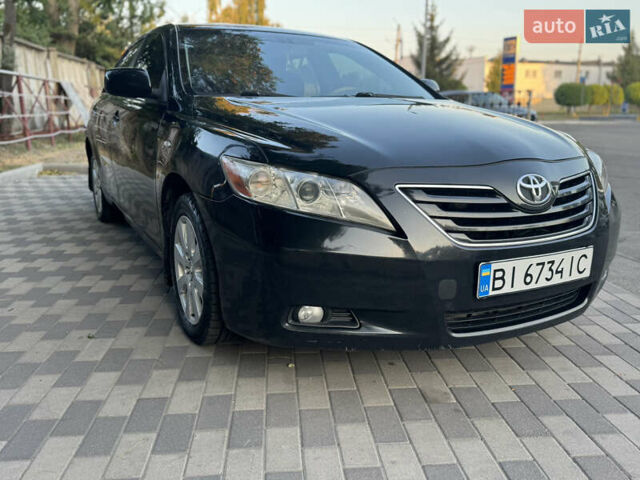 Черный Тойота Камри, объемом двигателя 3.46 л и пробегом 353 тыс. км за 6500 $, фото 3 на Automoto.ua