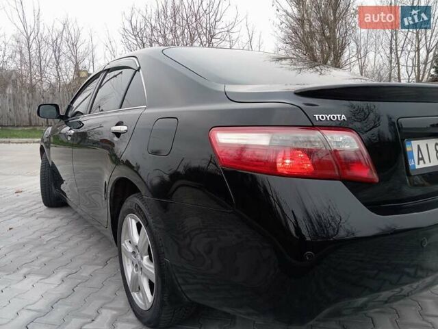 Чорний Тойота Камрі, об'ємом двигуна 2.4 л та пробігом 288 тис. км за 7700 $, фото 3 на Automoto.ua