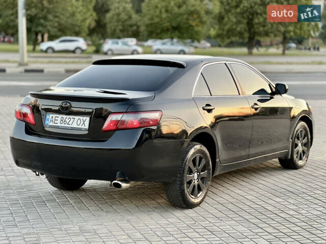 Черный Тойота Камри, объемом двигателя 2.4 л и пробегом 235 тыс. км за 7499 $, фото 21 на Automoto.ua