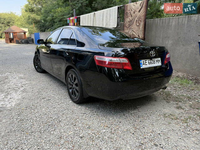 Черный Тойота Камри, объемом двигателя 2.36 л и пробегом 300 тыс. км за 7600 $, фото 4 на Automoto.ua