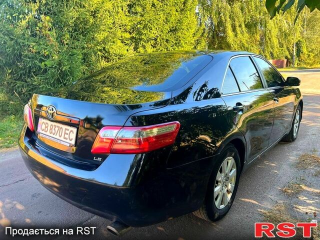 Чорний Тойота Камрі, об'ємом двигуна 2.4 л та пробігом 380 тис. км за 7499 $, фото 4 на Automoto.ua