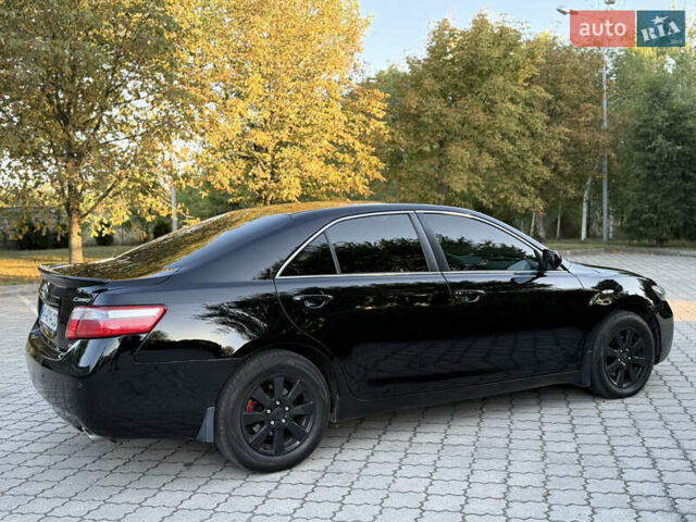 Черный Тойота Камри, объемом двигателя 3.5 л и пробегом 300 тыс. км за 7500 $, фото 7 на Automoto.ua