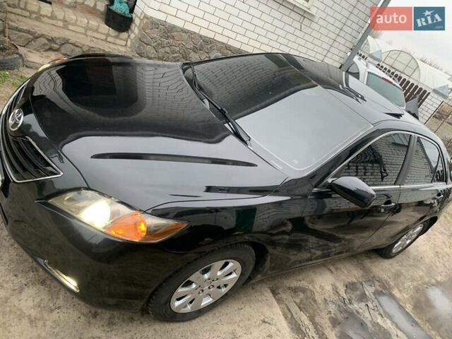 Черный Тойота Камри, объемом двигателя 3.5 л и пробегом 325 тыс. км за 8400 $, фото 15 на Automoto.ua