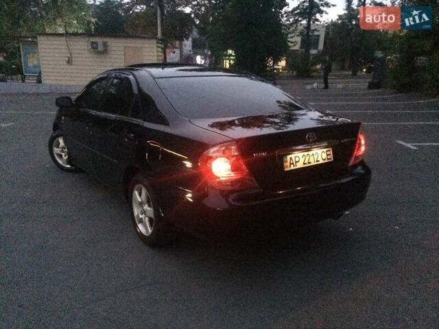 Чорний Тойота Камрі, об'ємом двигуна 2.36 л та пробігом 270 тис. км за 6100 $, фото 3 на Automoto.ua