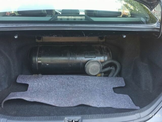 Черный Тойота Камри, объемом двигателя 2.4 л и пробегом 236 тыс. км за 7800 $, фото 13 на Automoto.ua