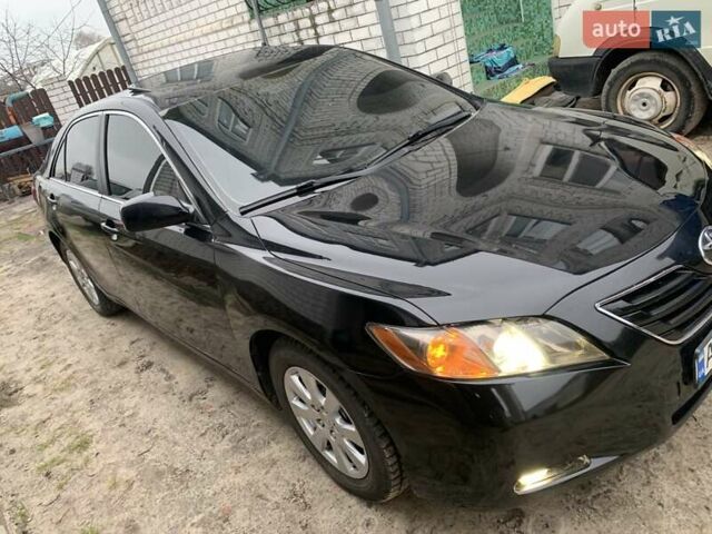 Черный Тойота Камри, объемом двигателя 3.5 л и пробегом 325 тыс. км за 7999 $, фото 1 на Automoto.ua