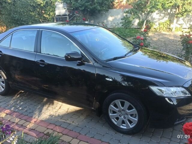 Черный Тойота Камри, объемом двигателя 2.4 л и пробегом 236 тыс. км за 7800 $, фото 19 на Automoto.ua