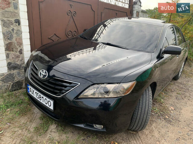 Черный Тойота Камри, объемом двигателя 3.5 л и пробегом 325 тыс. км за 7999 $, фото 65 на Automoto.ua