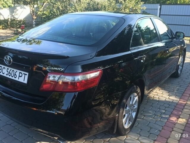 Черный Тойота Камри, объемом двигателя 2.4 л и пробегом 236 тыс. км за 7800 $, фото 21 на Automoto.ua